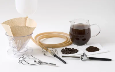 Enema-Tools-with-coffee-beans-and-coffee-in-a-glass-cup